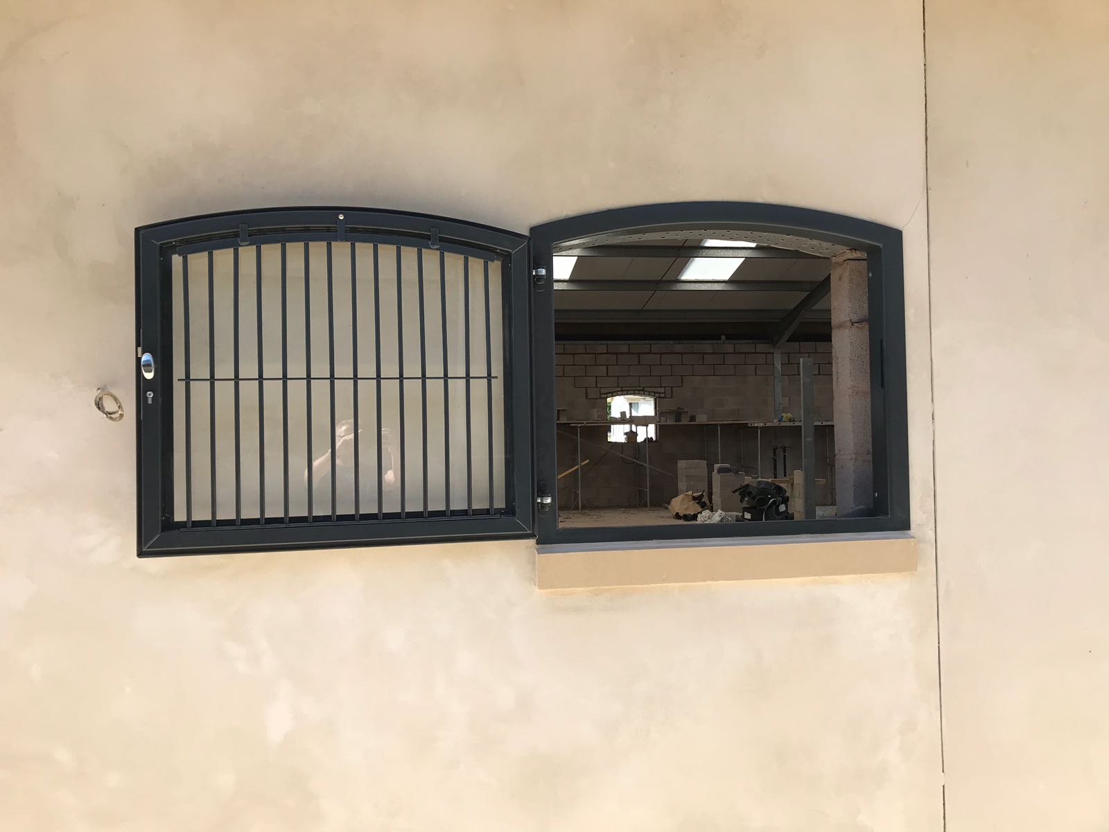Powder coated arch top hinged windows