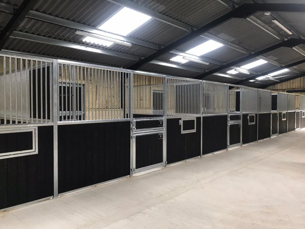 Imperial Stables with Split Pony Doors and Swivel Mangers, in Recycled Black Plastic By Monarch Equestrian